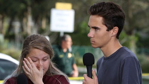Students Kelsey Friend and David Hogg recount their stories about yesterday's mass shooting at Marjory Stoneman Douglas High School where 17 people were killed, on February 15, 2018 in Parkland, Florida.