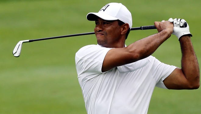 Tiger Woods on the tenth fairway during the first round of The Memorial golf tournament at Muirfield Village Golf Club.