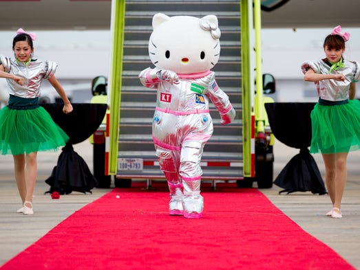Hello Kitty performs a dance routine to Michael Jackson's