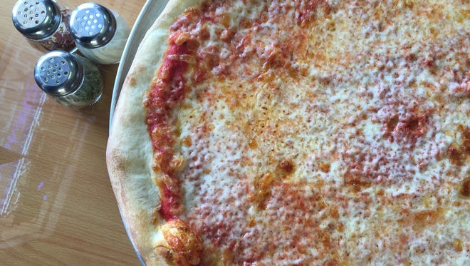 A classic cheese pizza from Mona Lisa in Cape Coral. The Cape was named among the 10 best cities in the U.S. for pizza lovers.