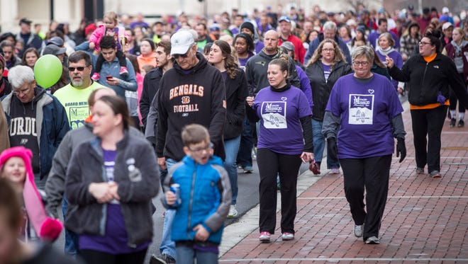 Hundreds of people gathered for the annual Walk a Mile in My Shoes event on Feb. 11 which helps raise money for the Muncie Mission. People who helped raise money walked from the Muncie Fieldhouse to the mission.