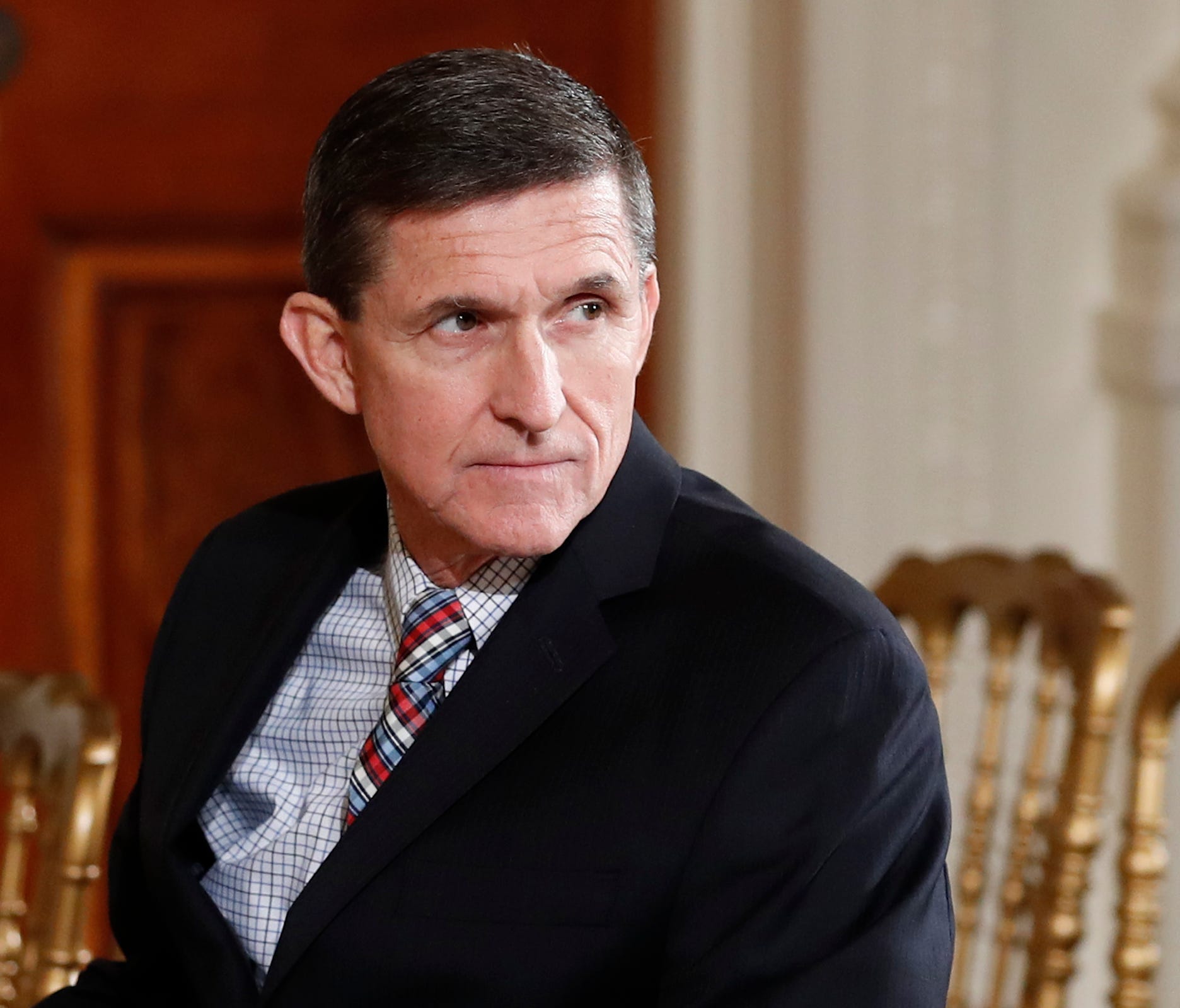 In this Feb. 10, 2017 file photo, then-National Security Adviser Michael Flynn sits in the East Room of the White House in Washington. Former CIA Director James Woolsey has accused former Trump administration National Security Adviser Michael Flynn o