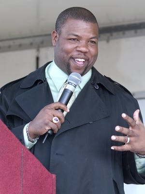 Bishop Alexis Thomas  speaks during the King Parade celebration at Martin Luther King Jr. School in Phoenix in 2005. Thomas died unexpectedly on Jan. 18, 2018, at age 50.