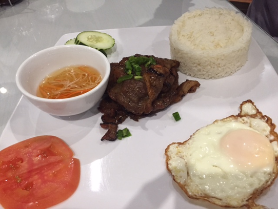 One of the entrees served at Pho 99 is the com thit