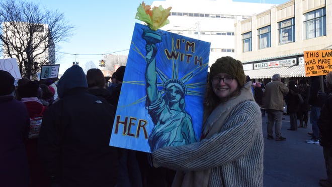 Christine Baker, 30, of Kingston, joined hundreds at a protest against President Donald Trump and the immigration ban Saturday in the City of Poughkeepsie.