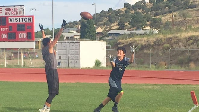 Silver's Jayson Allison reaches out to catch this pass during a 7-on-7 event that was held at Cobre High on Tuesday.