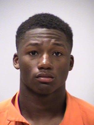 In a booking mug provided by the Kalamazoo County Sheriff, former Western Michigan receiver Bryson White is shown.