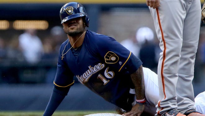 Domingo Santana and the Brewers fall to the Giants, 7-2, on Monday night at Miller Park.