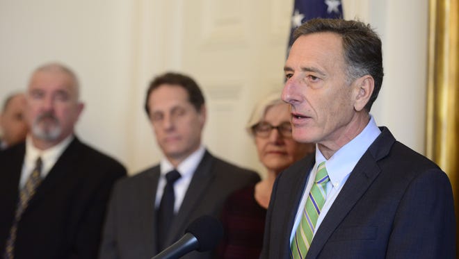 Gov. Peter Shumlin calls for millions of dollars in new funding for Vermont's child welfare system at a news conference in Montpelier on Thursday.