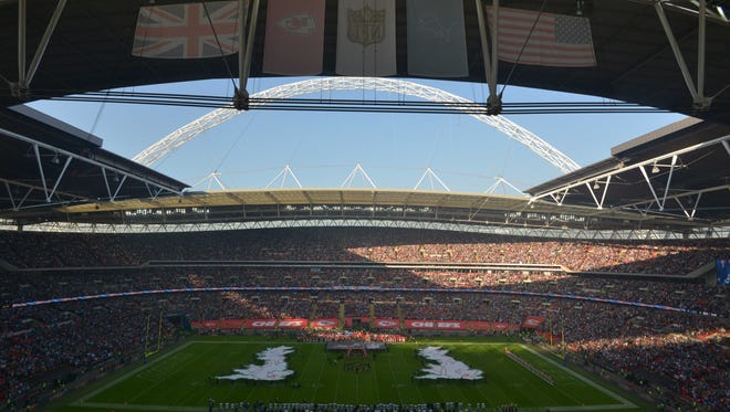 General view of the playing of the British and the United States national anthems before an NFL game at Wembley Stadium.