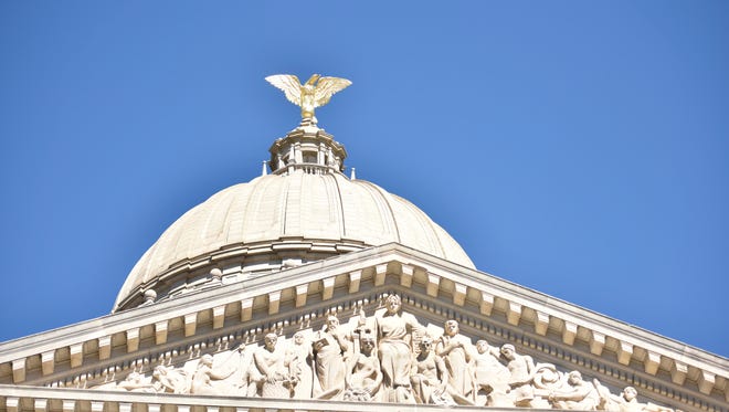 The frieze and dome of the state capitol in Jackson. An 8-foot-tall eagle made of solid copper and gilded with gold leaf adorns the dome.