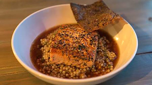 Salmon Quinoa is one of the casual contemporary American dishes served at BLK Live.