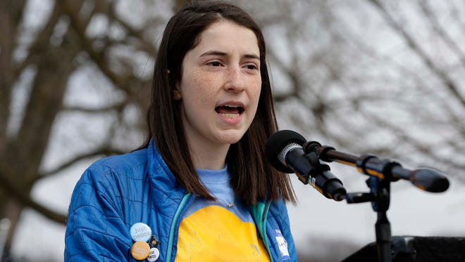 Katie Eder of Shorewood High School speaks at the 50 Miles More rally in Janesville.