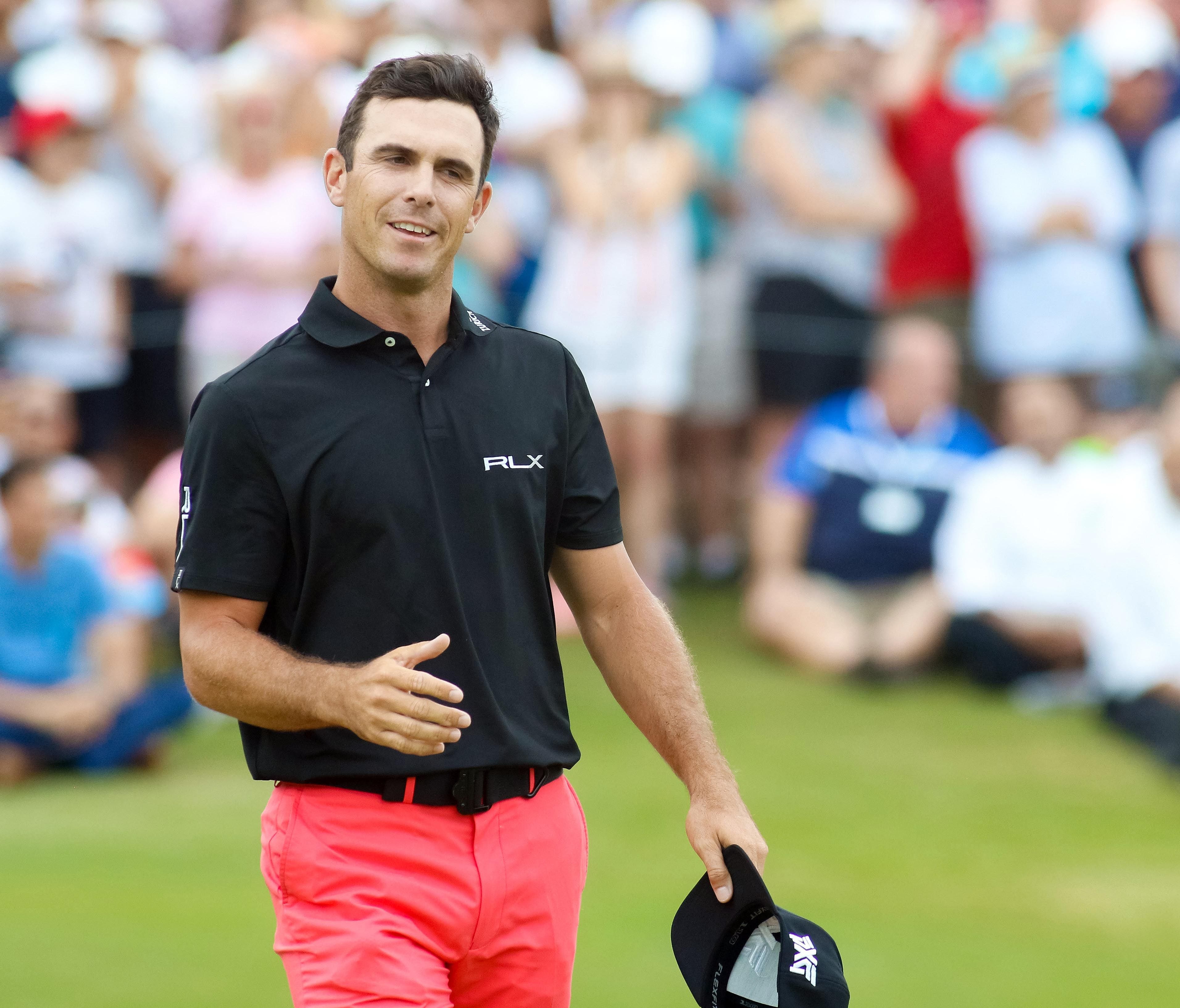 Billy Horschel goes to shake the hand of Jason Day (not pictured) after beating Day in a playoff to win the AT&T Byron Nelson on May 21.