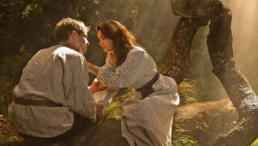 This image released by Roadside Attractions shows Max Irons, left, and Samantha Barks in a scene from, "Bitter Harvest."