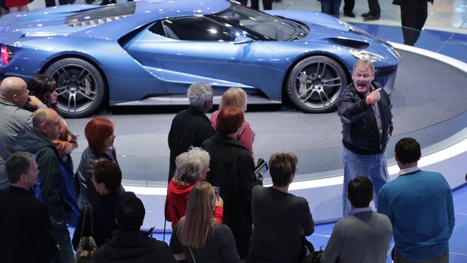 Detroit Free Press auto critic Mark Phelan talks about the new Ford GT on Wednesday with lucky readers who won the Detroit Free Press Auto Show VIP tour.