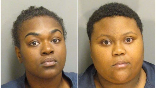 Raven Blocton, 19, (left) and Jameshia Beamon, 19, were charged with criminal mischief and criminal use of defensive spray, a felony, and were being held Wednesday morning on $3,500 bond, documents show.