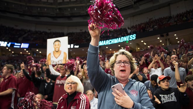 Troy fan Melanie Alexander cheers during the 1st round of the NCAA Tournament at Bon Secours Wellness Arena in downtown Greenville on Friday, March 17, 2017.