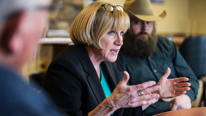 Cathy Glasson, democratic candidate for governor, holds a roundtable discussion about health care and other issues on Tuesday, Jan. 30, 2018, at the Blue Top Tap in Lone Tree. 