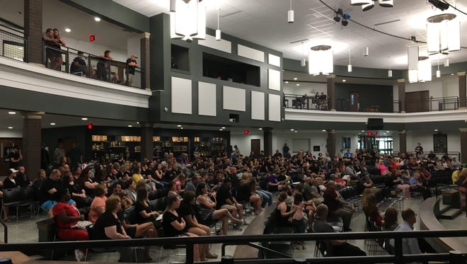 Hundreds of parents and residents attend a Madison school board meeting on Tuesday, June 26, 2018.