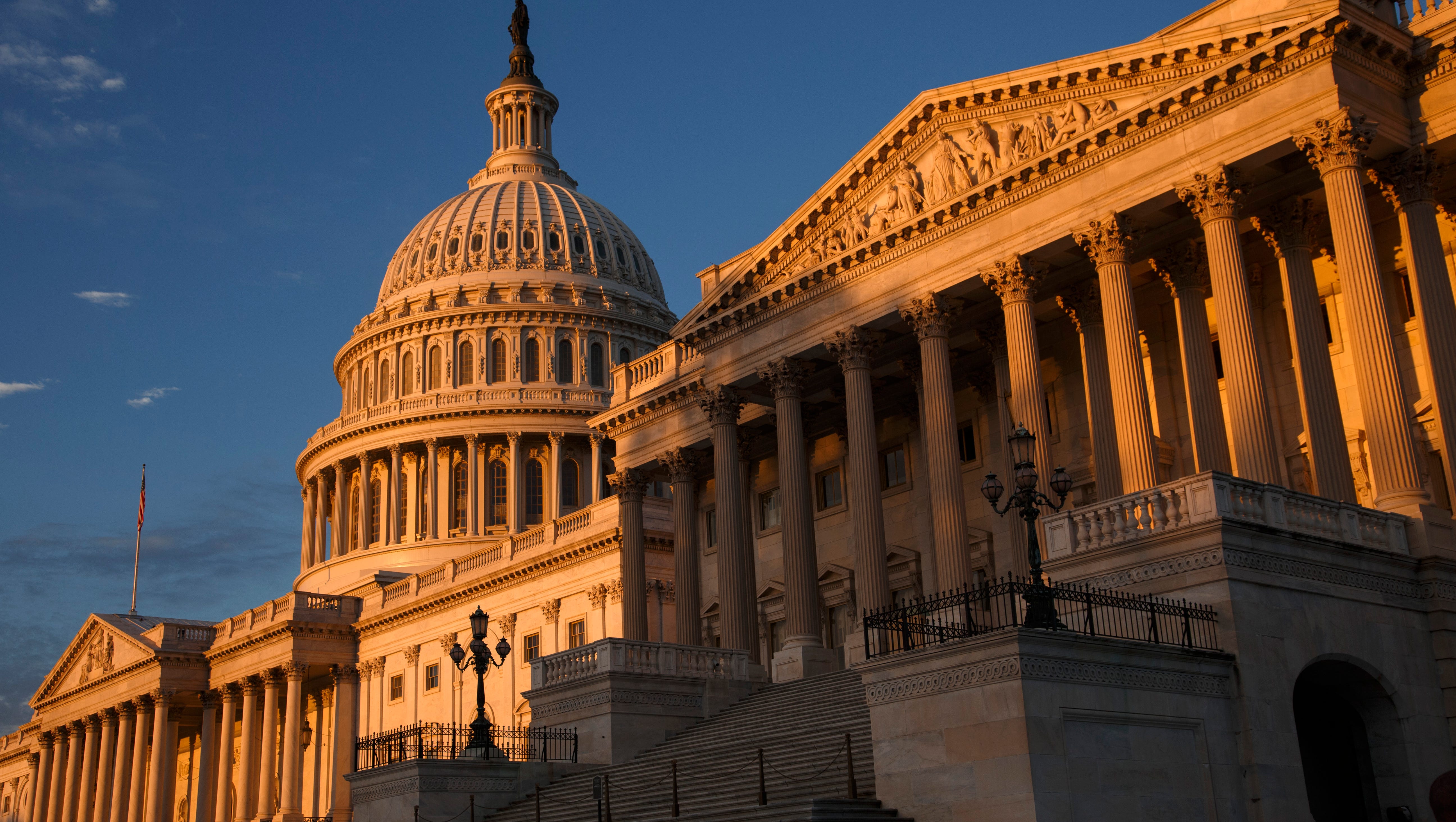 The morning sun illuminates the U.S. Capitol in Washington on Monday.