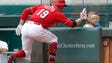Aug. 31: Reds first baseman Joey Votto high fives six-year