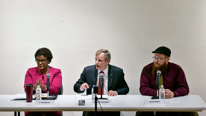 From left, Kim Bracey, Michael Helfrich and Dave Moser participate in a York mayoral candidate debate Thursday, Oct. 26, 2017, in Marketview Arts in York. The three candidates — Democratic incumbent Kim Bracey, Republican candidate Michael Helfrich and Libertarian candidate Dave Moser — are running for mayor of York in the Nov. 7 election.