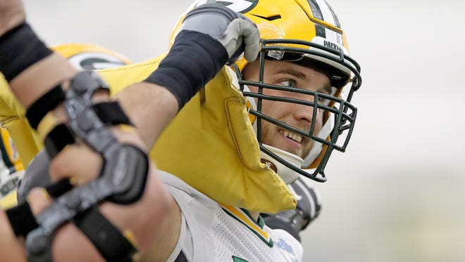Green Bay Packers offensive tackle Jason Spriggs (78) has fun with a weight bag during practice inside the Don Hutson Center Wednesday, November 15, 2017 in Ashwaubenon, Wis.