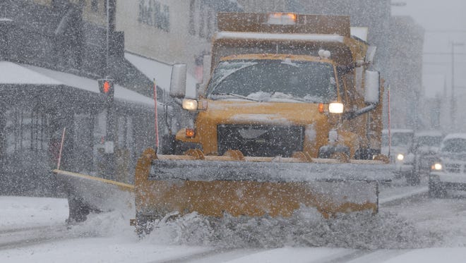 Up to 3 more inches of snow is possible in the Manitowoc area Tuesday, March 1. Pictured, a Manitowoc Public Works truck plows South Eighth Street in downtown Feb. 2.