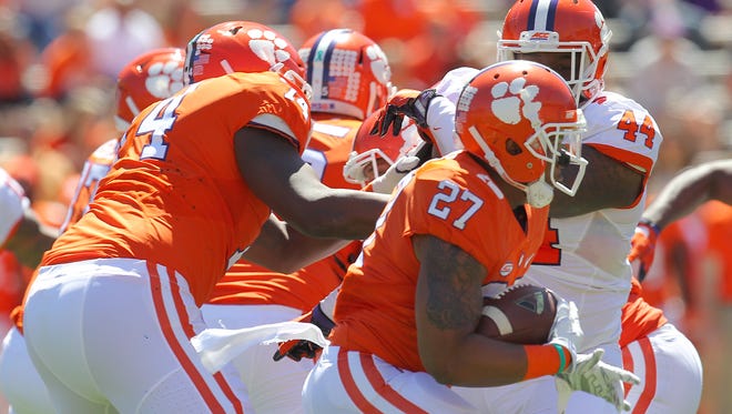 Clemson running back C.J. Fuller (27) carries the ball during Saturday's spring game.