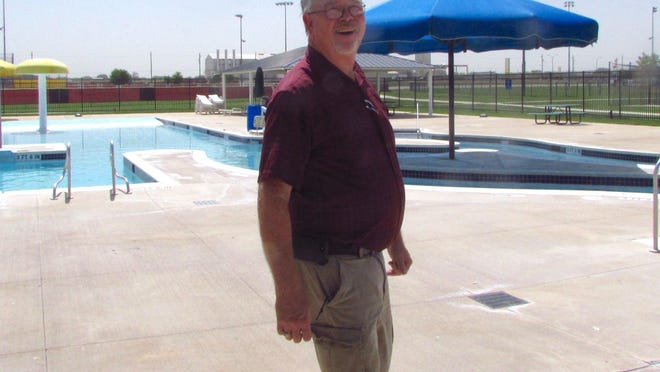 David Withers, parks and recreation director for the City of Brownwood, walks Tuesday at the Camp Bowie Family Aquatic Center, where minor maintenance is ongoing.