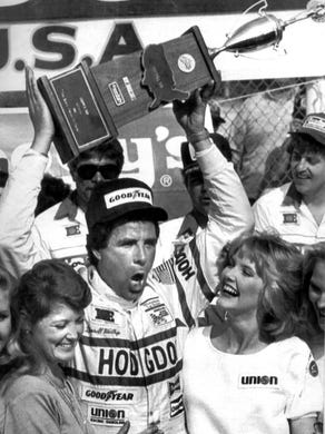 Darrell Waltrip celebrates his victory in the Sportsman