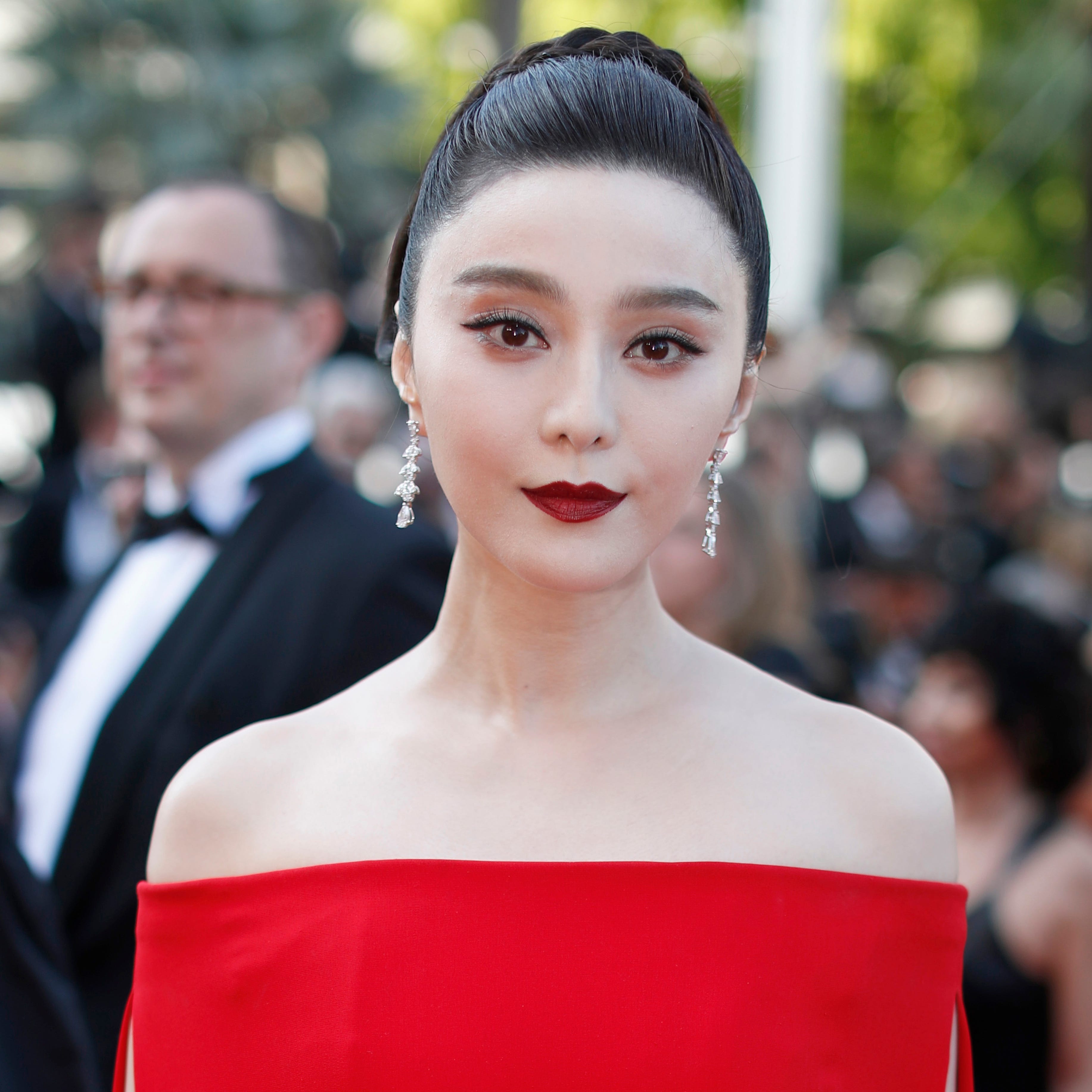 Fan Bingbing poses for photographers as she arrives for the screening of the film 