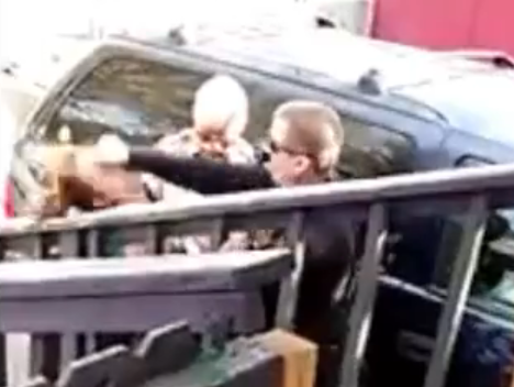 Flagstaff police Officer Jeff Bonar was caught on video striking a woman during a Wednesday afternoon arrest.