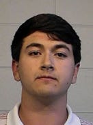 This Nov. 8, 2015 photo provided by Tuscaloosa Police Department shows Brandon James Williford. Several police officers were suspended with pay Monday, Nov. 9, 2015, after videos posted online showed officers using a stun gun and baton to break up a post-football game party and arrest Williford and two other University of Alabama students. (Tuscaloosa Police Department via AP)