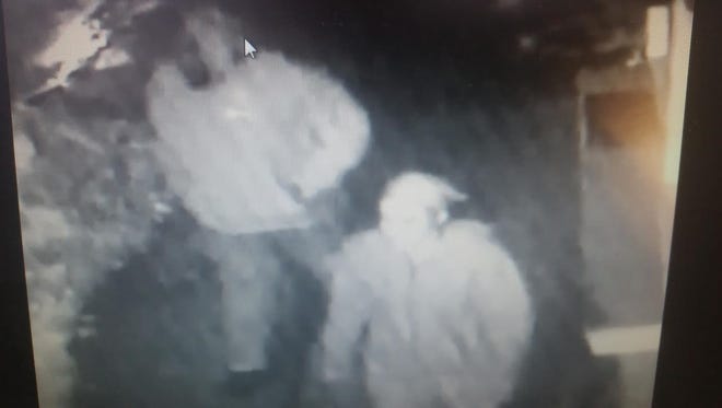 Two suspects, a black male and a light-skinned female, are wanted in connection with a pair of armed robberies that occurred in Clifton's Botany Village section last month. This surveillance photo was taken moments before one of the robberies.