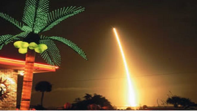 A view of a night launch from El Leoncito in Titusville.