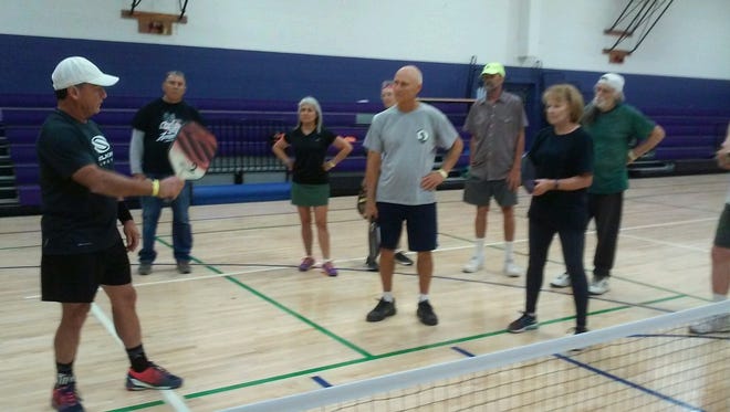 Randy Coleman, a professional pickleball player with a 5.0 ranking, worked with local players at Meerscheidt Recreation Center in June.