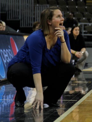 Highlands head coach Jaime Richey and Notre Dame head coach Nicole Levandusky (background, right), watch the action in the 9th Region final in March of 2013.