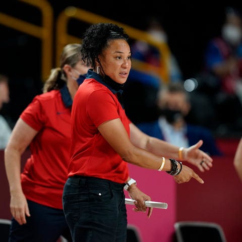 United States' head coach Dawn Staley gestures to 