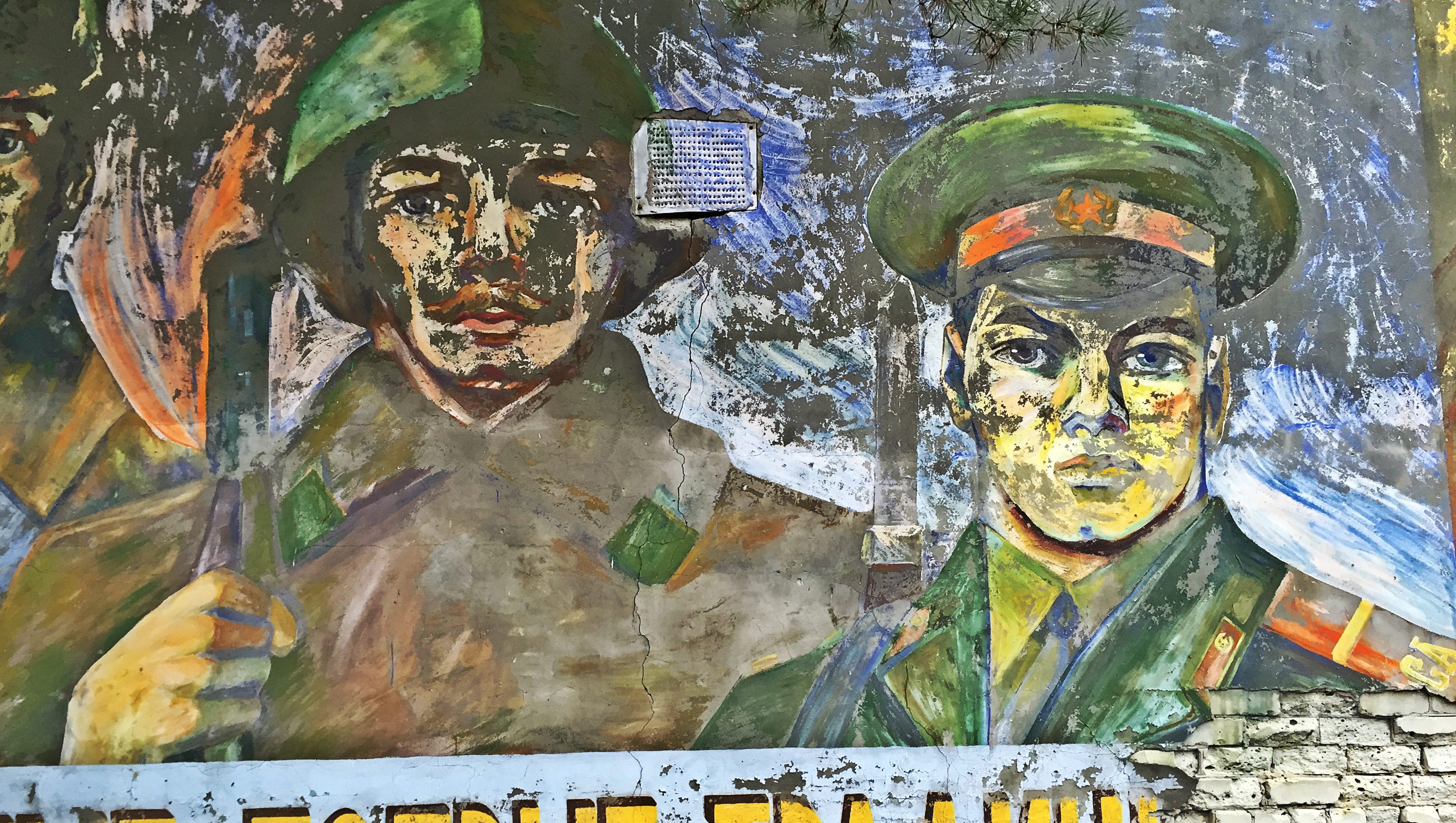 A mural featuring soldiers in Chernobyl's Exclusion Zone.