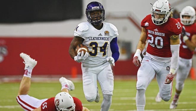 Western Illinois' Steve McShane (34) rushes for a touchdown during a game against USD Saturday, Oct. 29, 2016, at the DakotaDome on the University of South Dakota campus in Vermillion, S.D. 