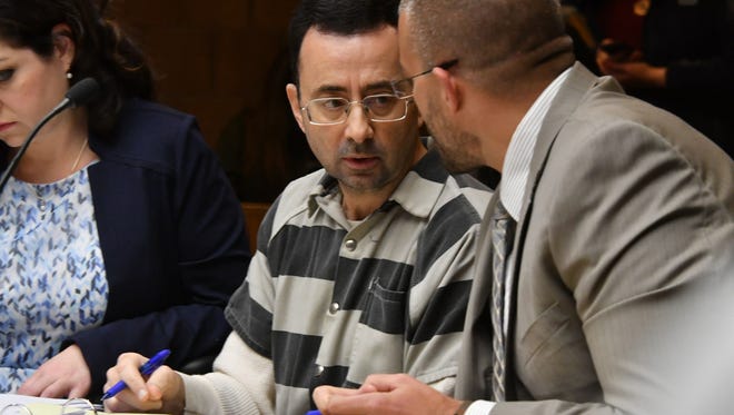Dr. Larry Nassar appears in court in Mason, Michigan Friday for a hearing in a sexual assault case.