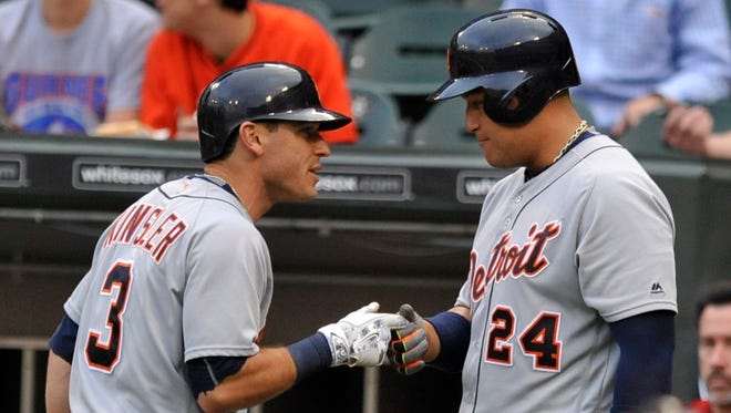 The Detroit Tigers' Miguel Cabrera, right, celebrates with Ian Kinsler after Kinsler hit a solo home run against the Chicago White Sox on June 13, 2016, in Chicago.