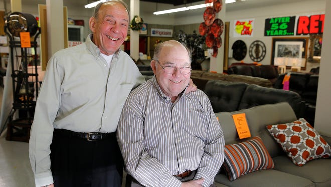 Gerald Mallin, left, and his brother Gary Mallin, owners of Leader Furniture are closing the doors to their Over-the-Rhine business that has located at Findlay Market for five decades. The seller of home furnishings, appliances and other home decor items launched a merchandise liquidation sale in late November in preparation for the closure. A store closing date has not been set. Photo shot Tuesday November 29, 2016.