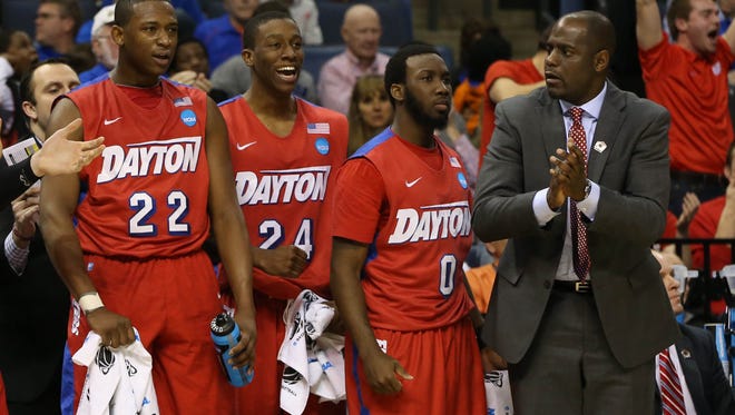 Allen Griffin, far right, spent the past six seasons as an assistant coach at the University of Dayton. The former Syracuse point guard was added to Jim Boeheim's staff on Thursday.