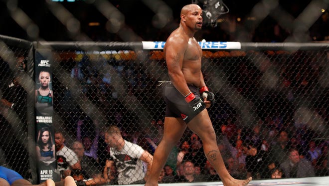 Daniel Cormier celebrates after defeating Anthony Johnson on Saturday during UFC 210 at KeyBank Center in New York.