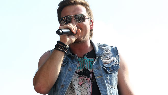 Morgan Wallen performs at Great American Ball Park for the What Makes You Country Tour on Saturday, June 16, 2018, in Cincinnati.