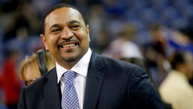Former Golden State Warriors head coach Mark Jackson and current ESPN commentator smiles before the start of a game against the Cleveland Cavaliers at Oracle Arena.