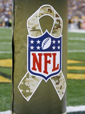 NFL goal posts will be wrapped in camouflage to honor military veterans.